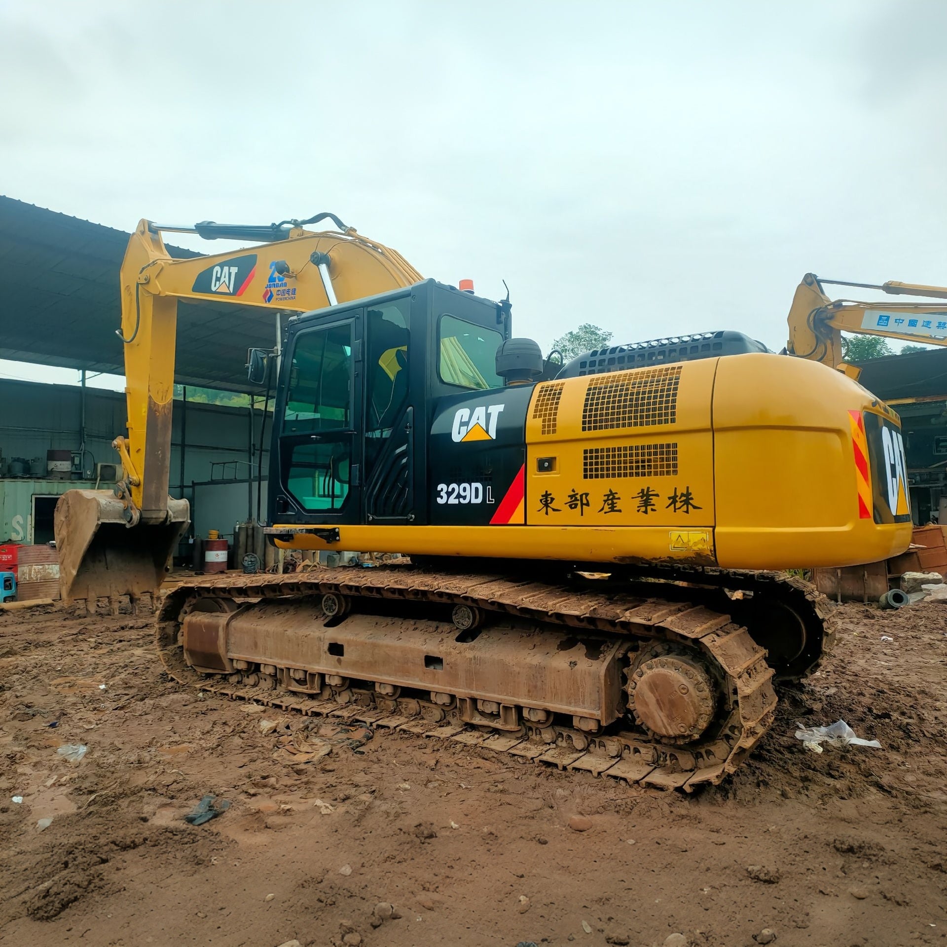 — Caterpillar 329DL